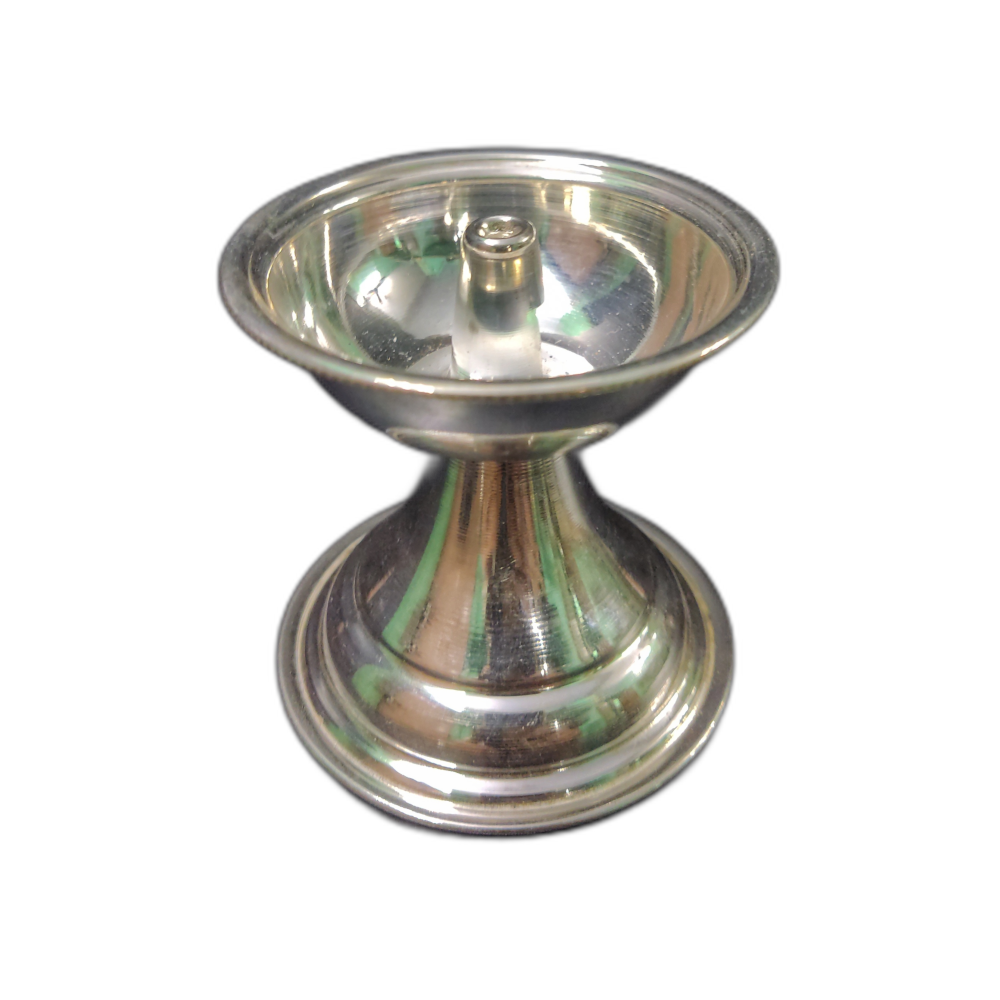 Sterling Silver Jothi Diya also known as Sterling Silver Jothi is a Sterling Silver Lamp of 92.5% Purity partially machined and handcrafted to perfection by Chennai Silver Smith.